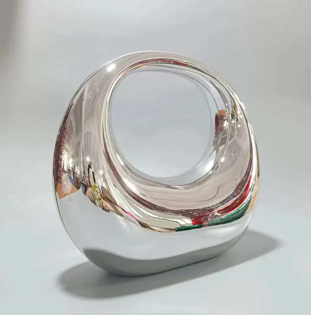 Sculptural Elegance Gold Clutch