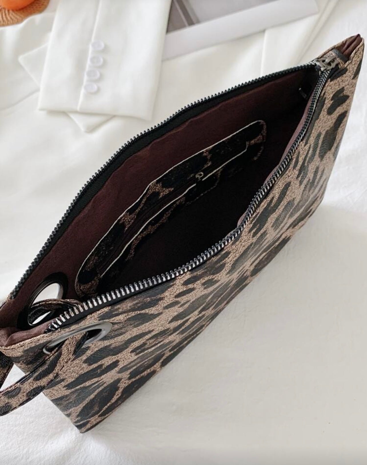Animal attraction clutch